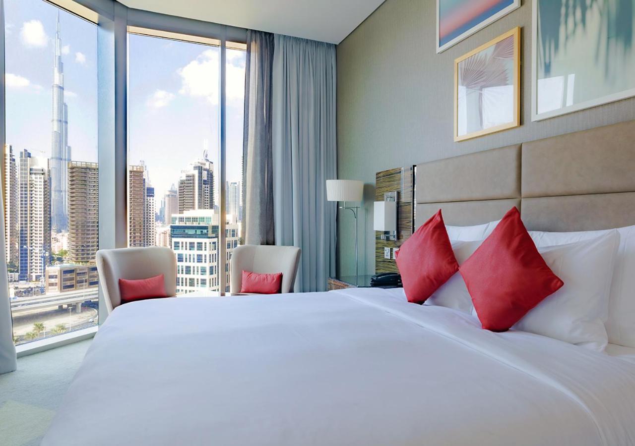 Hyde Hotel Dubai Exterior photo A bedroom at the Address Downtown Hotel