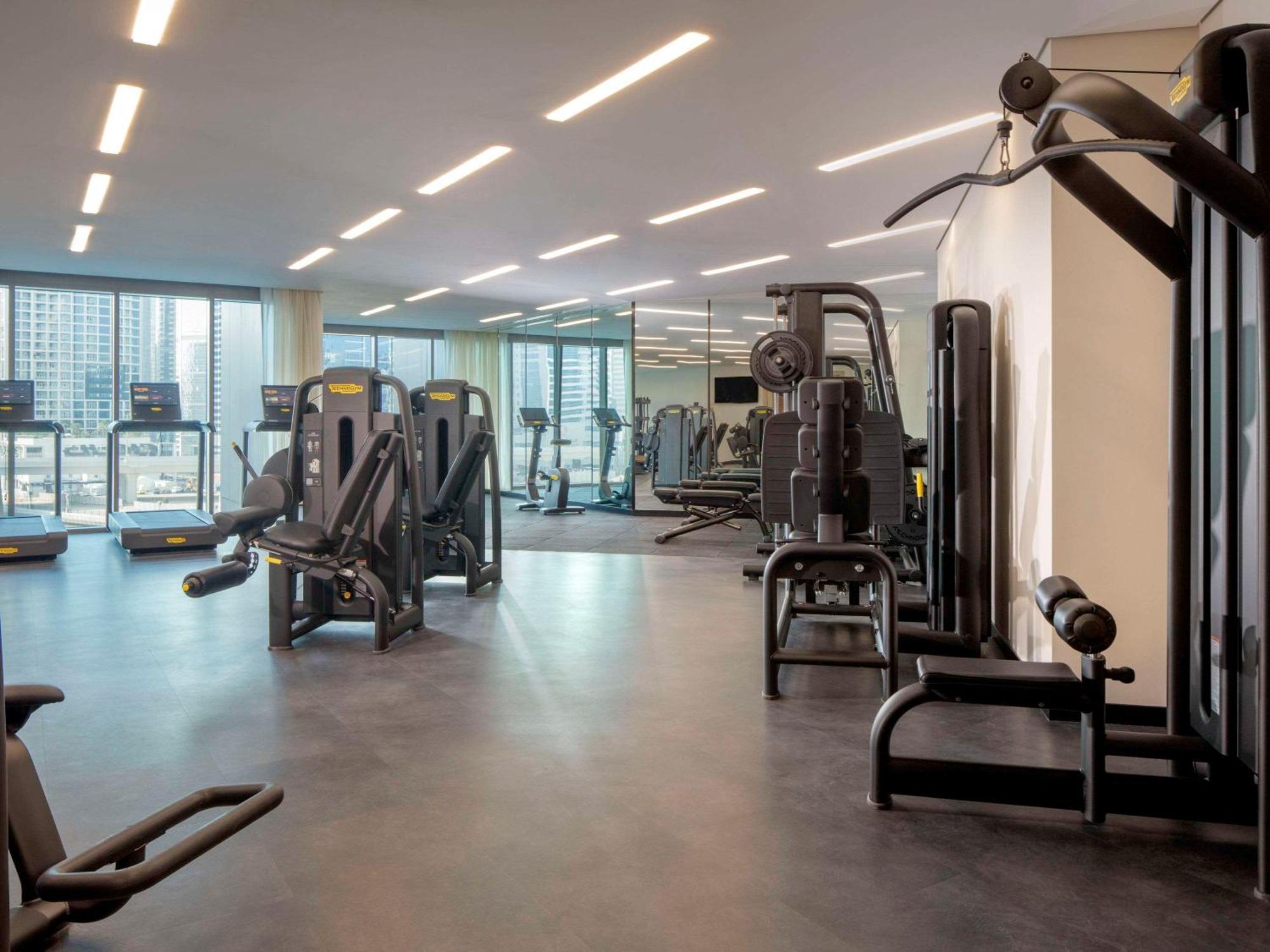 Hyde Hotel Dubai Exterior photo The gym at the Ritz-Carlton, DIFC