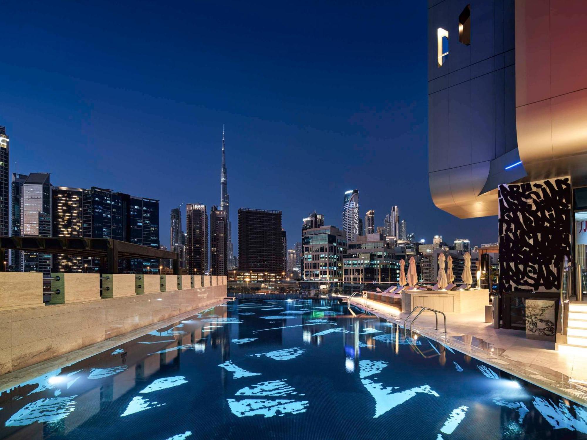 Hyde Hotel Dubai Exterior photo The pool at the rooftop of the hotel