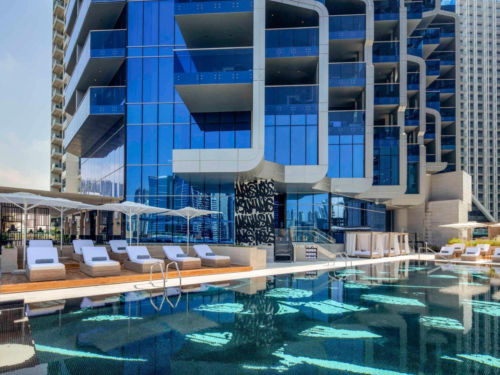 Hyde Hotel Dubai Exterior photo The pool at the SLS